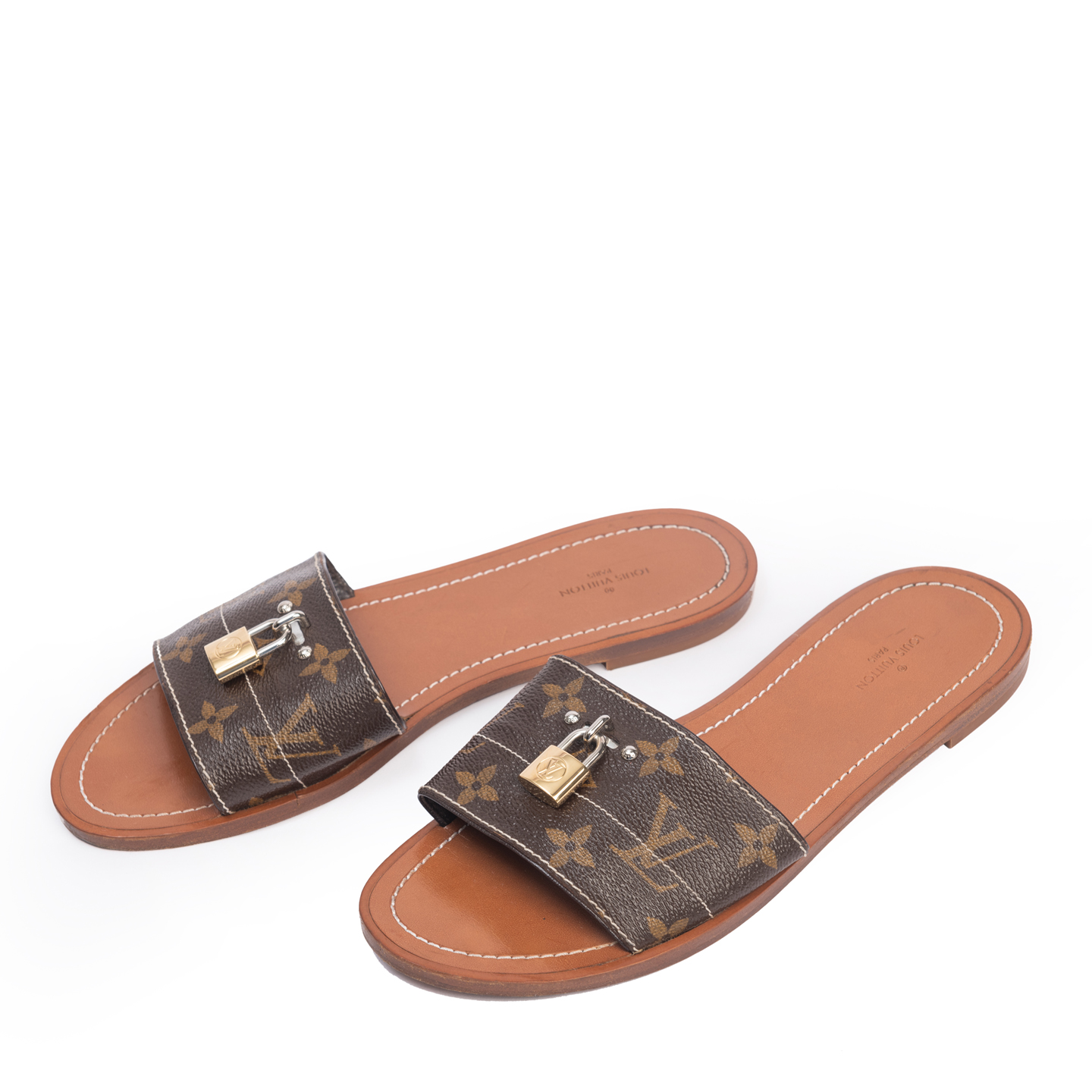 Louis Vuitton Lock Slides :: Keweenaw Bay Indian Community